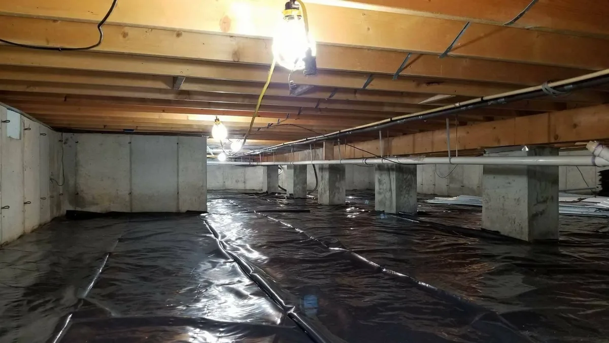 crawl space vapor barrier installation